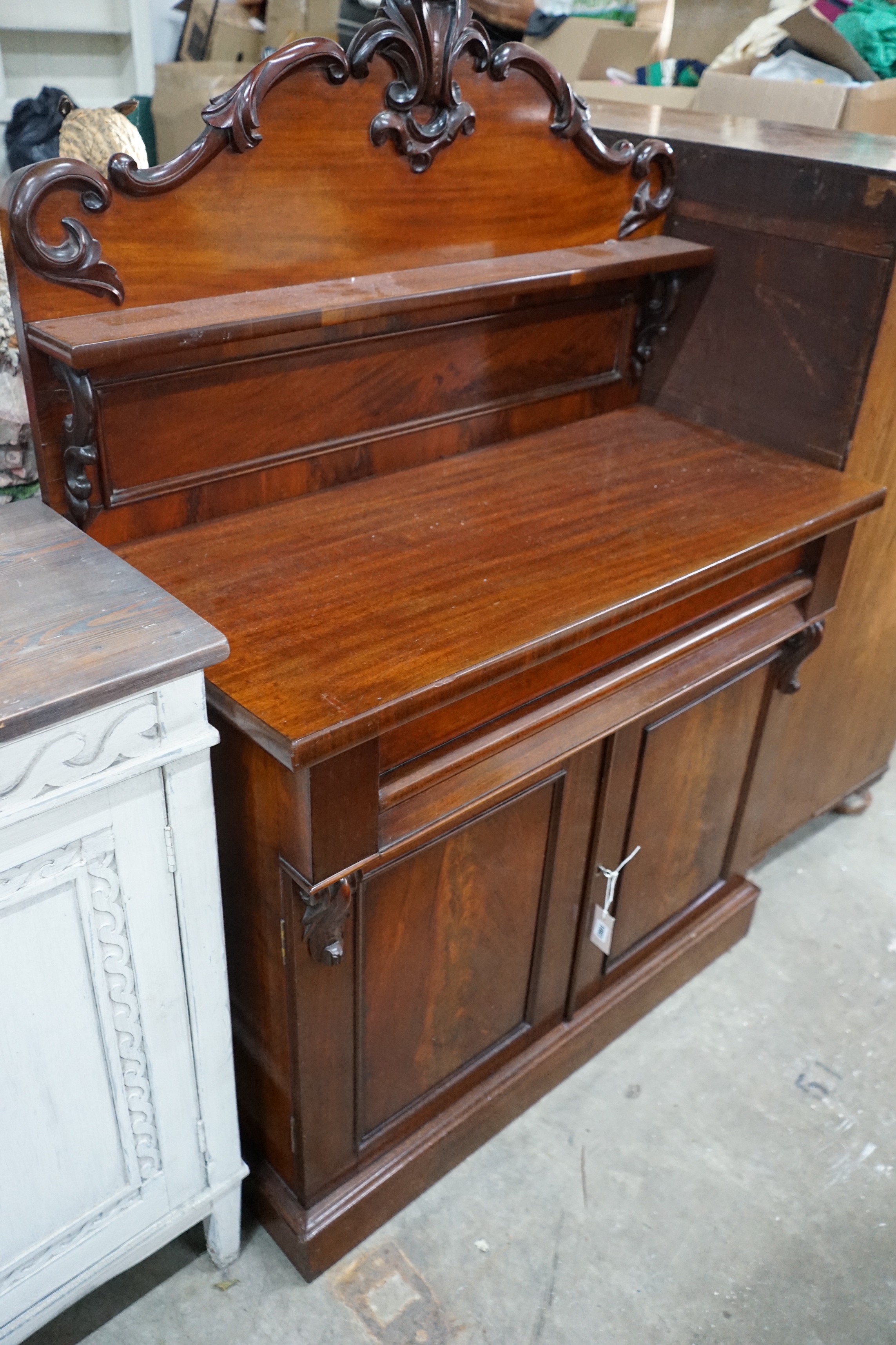 A small Victorian mahogany chiffonier, width 100cm, depth 46cm, height 140cm